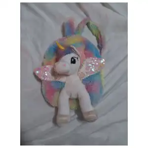 Mochila unicornio peluche miniatura 2
